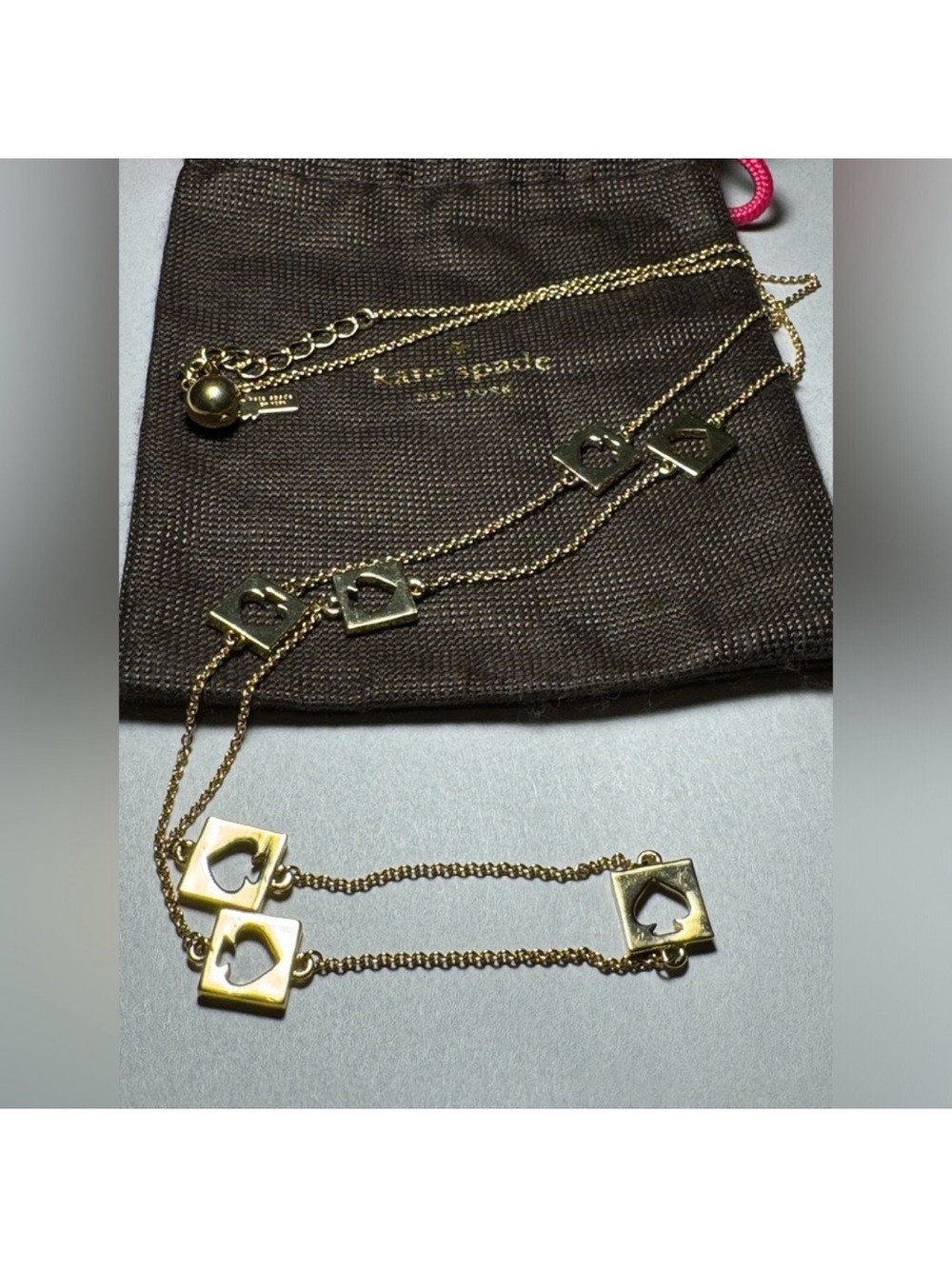 Kate Spade NWOT Gold-Tone Signature Spade Cutout Long Station Necklace wDust Bag